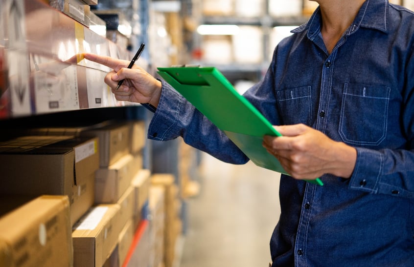 image of an employee tracking inventory